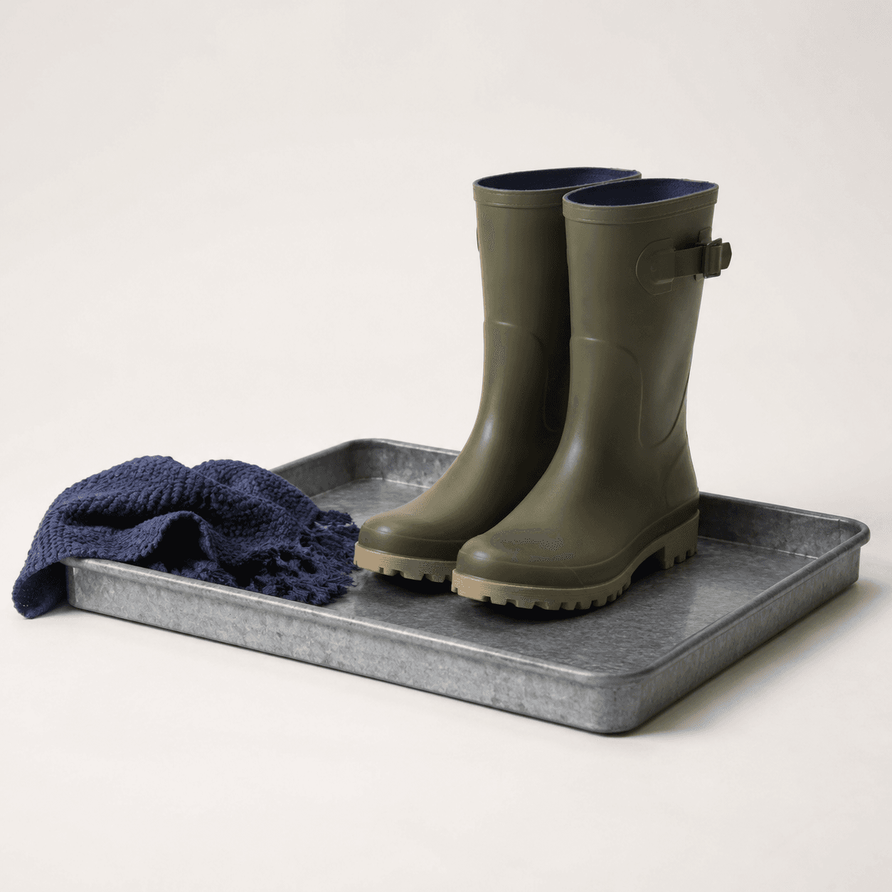 Boot Tray — A raised-rim tray that catches mud, slush and water.